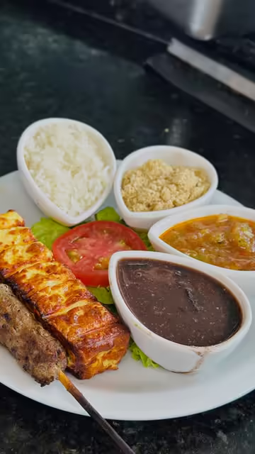 Grilled skewers with Mar de Copa side dishes